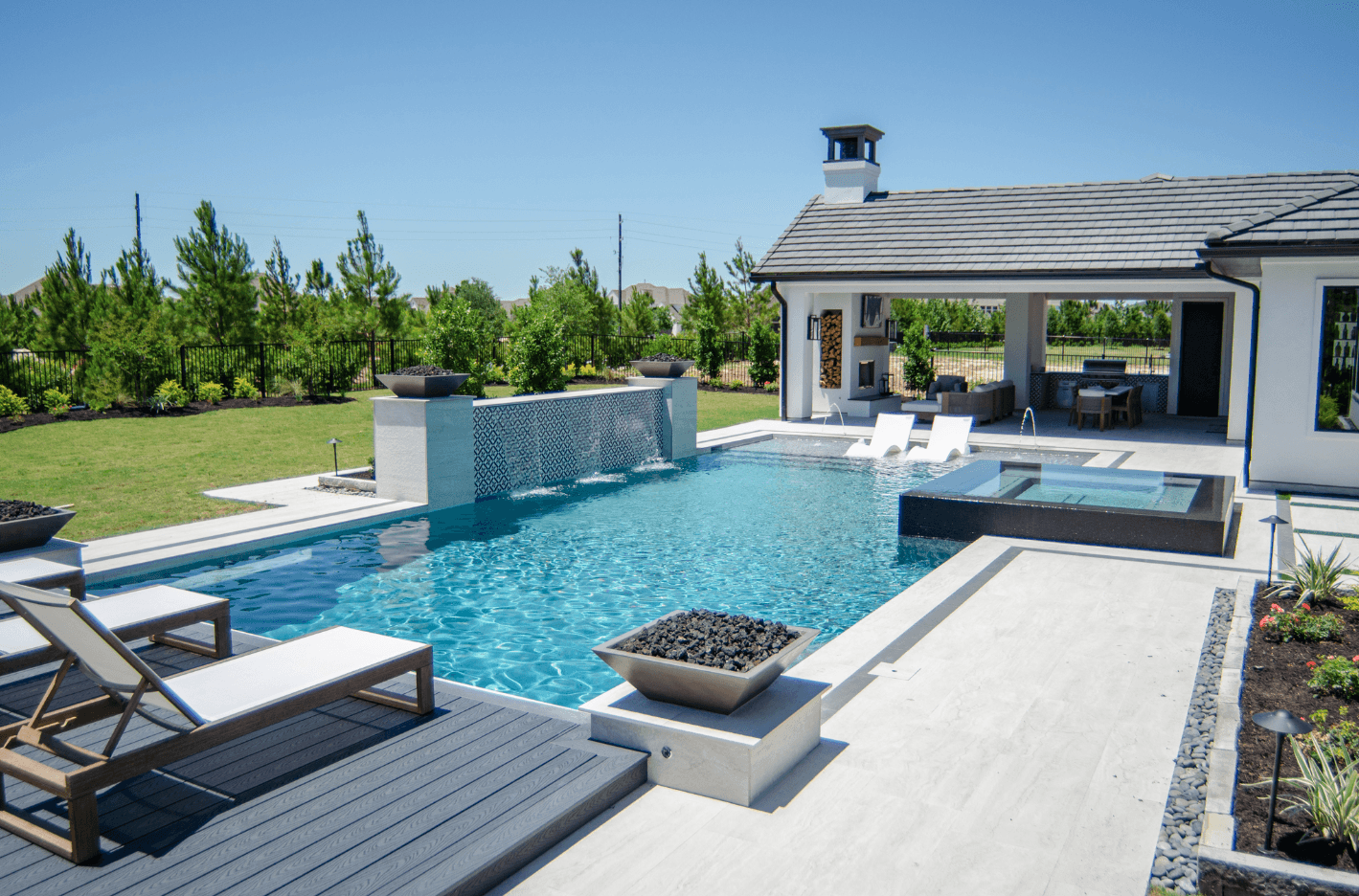 Custom pool and outdoor living space built by Pinnacle Pools and Landscape