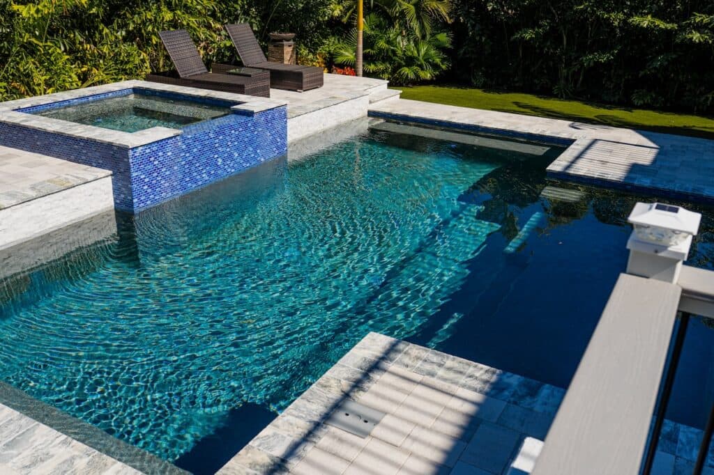 Pool Remodeling project in El Dorado Hills — Remodeled pool with raised tile spa and waterfall feature