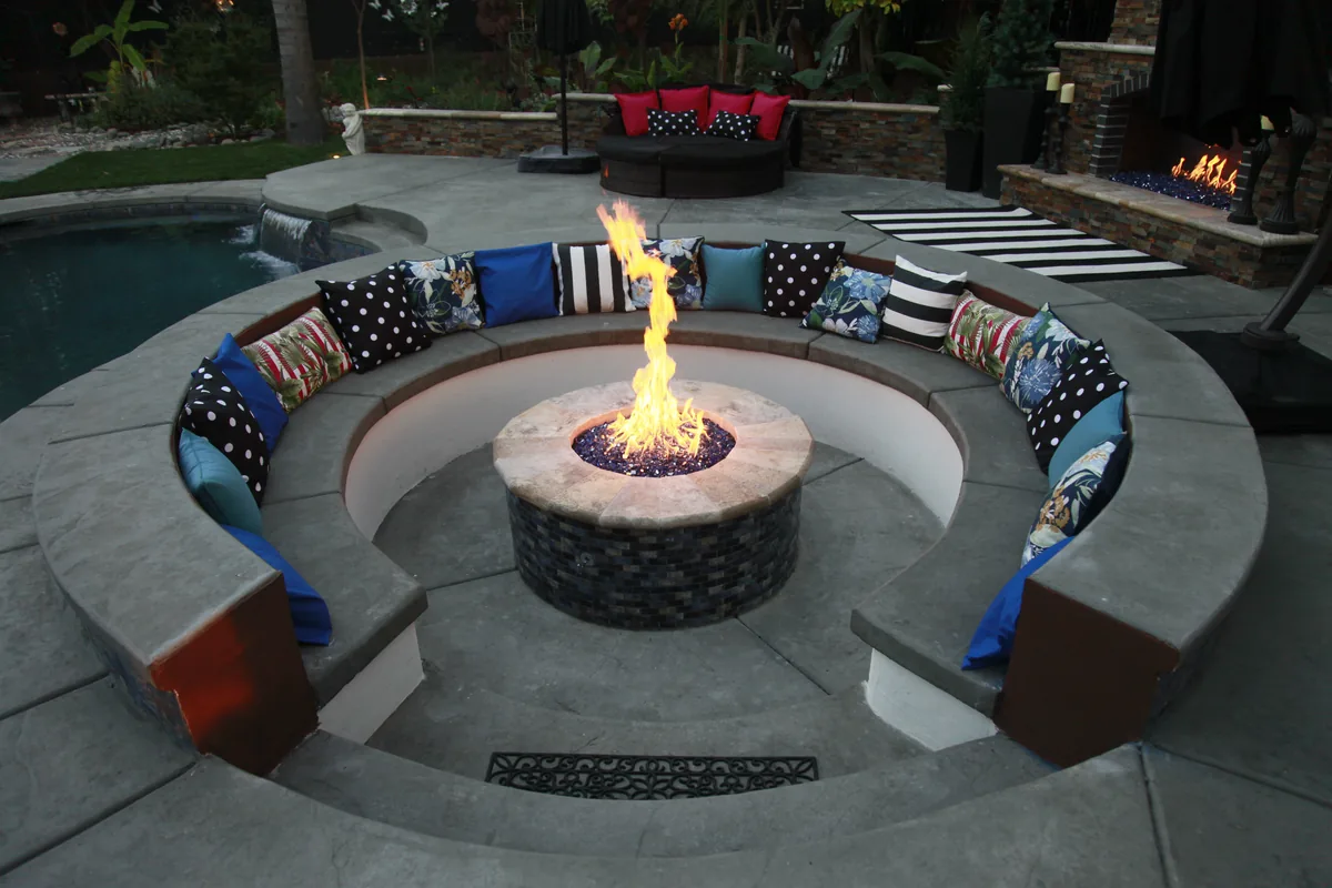 Fire Pits detail — Circular fire pit curved bench seating by Pinnacle Pools and Landscape, Sacramento CA