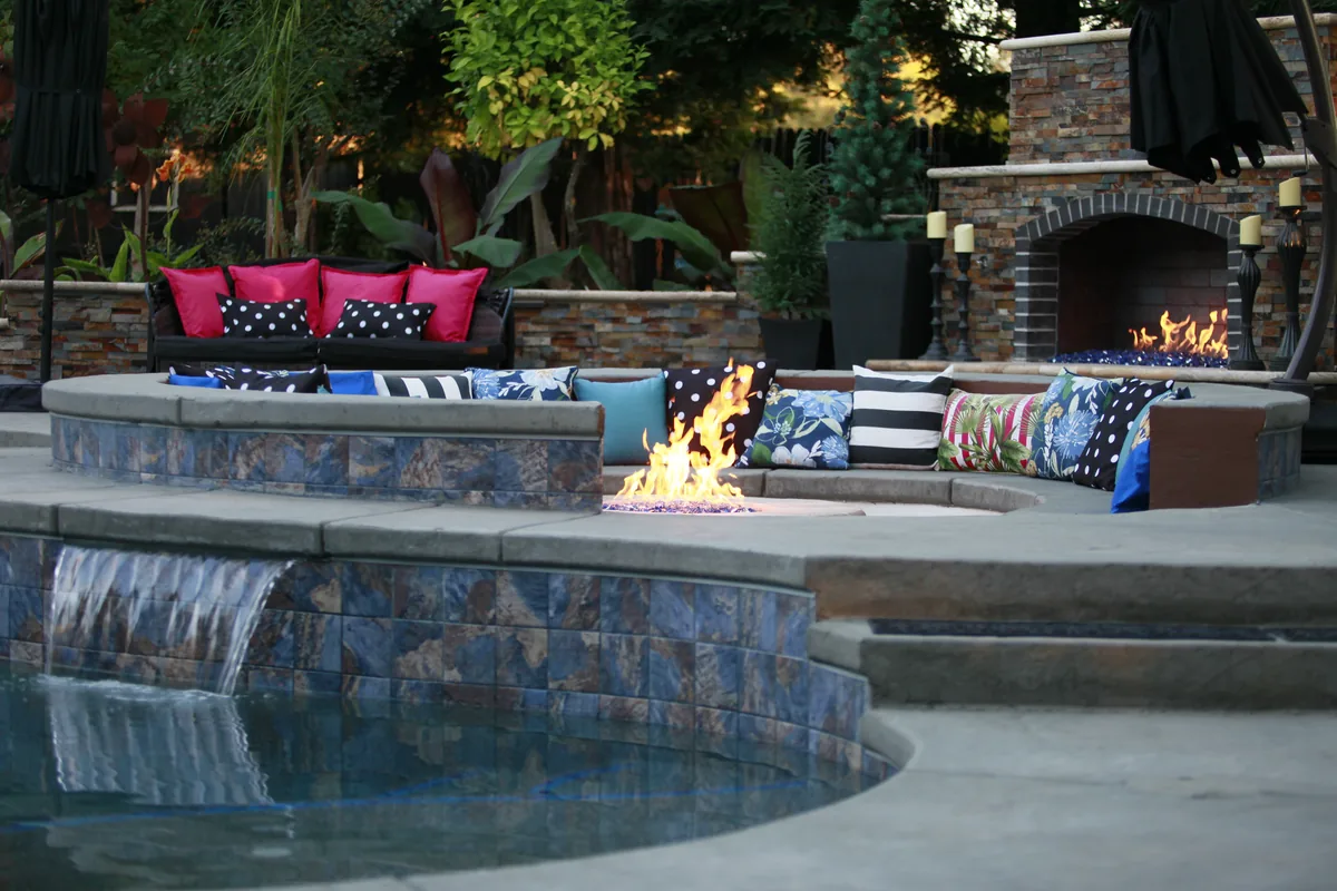 Fire Pits project in Wilton β Fire pit lounge seating waterfall spa by Pinnacle Pools and Landscape, Sacramento CA