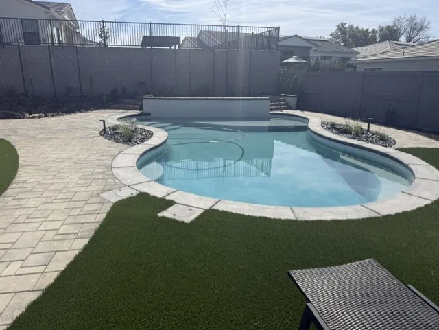 Artificial Turf detail — Freeform pool artificial turf backyard by Pinnacle Pools and Landscape, Sacramento CA