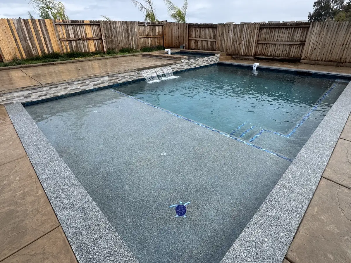Pool Remodeling project in Folsom β Geometric pool spa sheer descent waterfall by Pinnacle Pools and Landscape, Sacramento CA