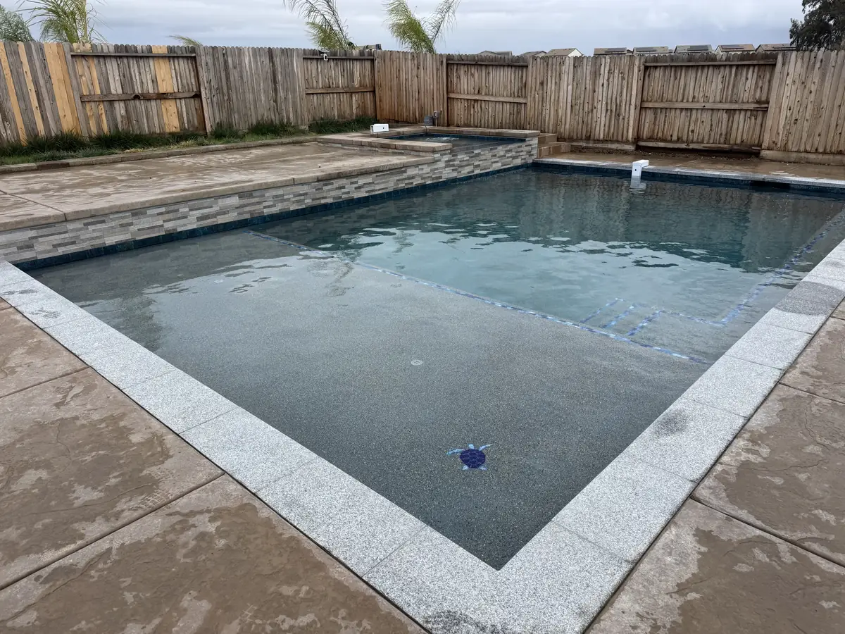 Pool Remodeling detail β Geometric pool spa water feature deck by Pinnacle Pools and Landscape, Sacramento CA