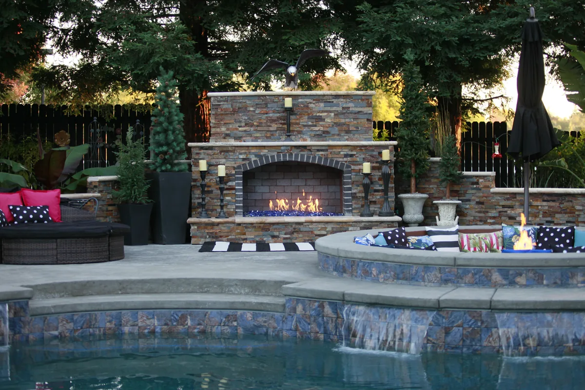 Fire Pits detail β Outdoor fireplace fire pit lounge dusk by Pinnacle Pools and Landscape, Sacramento CA