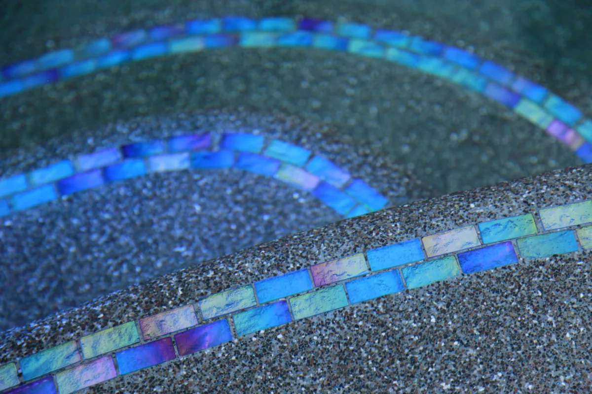 Pool Remodeling detail — Pool glass tile mosaic band detail by Pinnacle Pools and Landscape, Sacramento CA