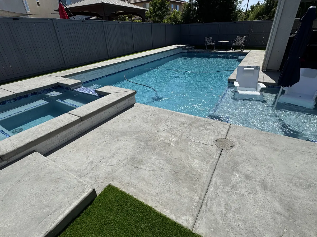 Landscaping project in Rancho Cordova β Pool spa stamped concrete deck turf by Pinnacle Pools and Landscape, Sacramento CA