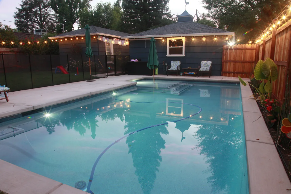 Concrete detail β Rectangular pool string lights poolhouse by Pinnacle Pools and Landscape, Sacramento CA