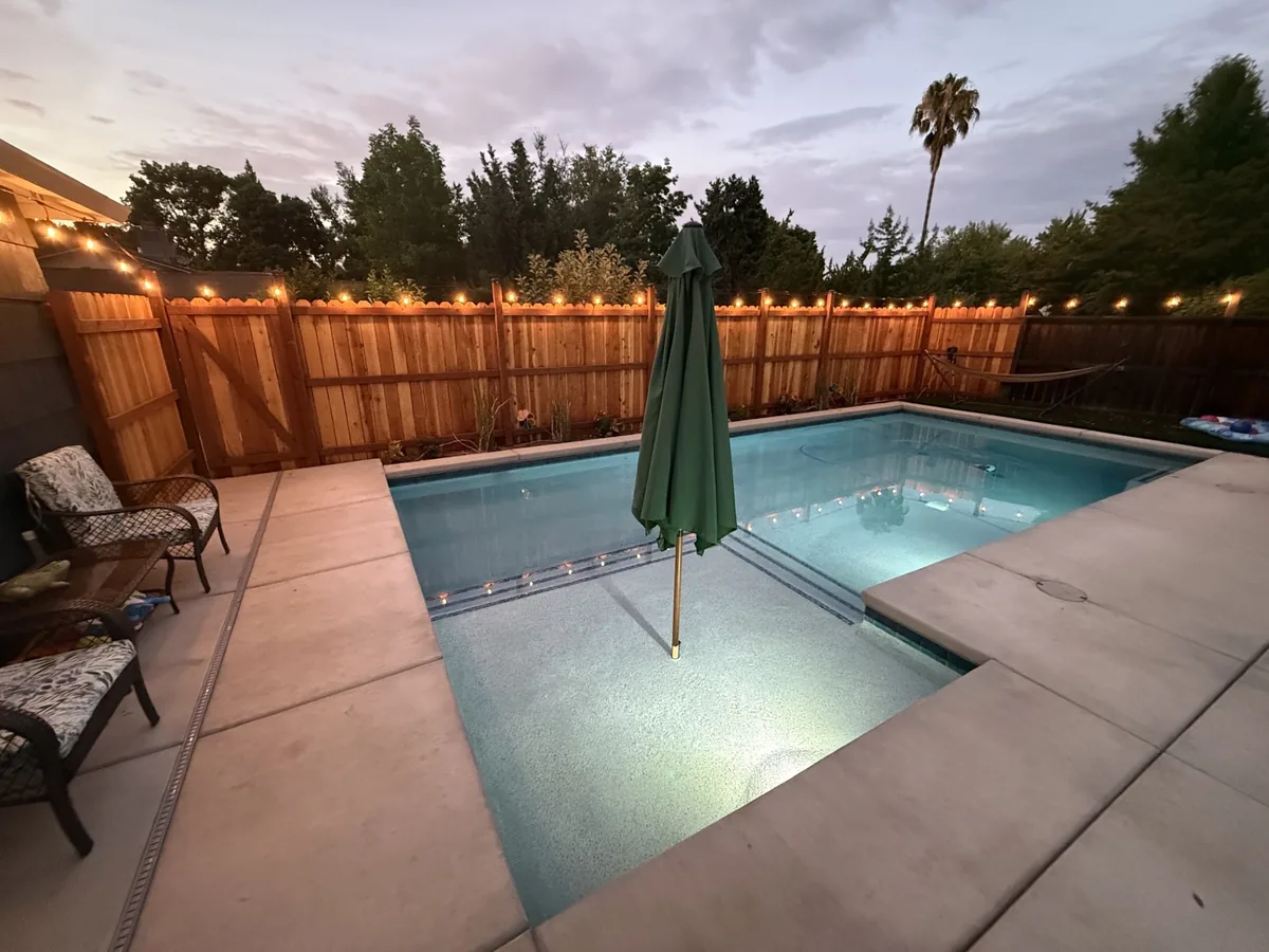 Artificial Turf project in Sacramento β Small pool spa string lights patio by Pinnacle Pools and Landscape, Sacramento CA